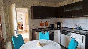 Fridge, coffee/tea maker, electric kettle, toaster