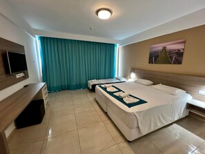 Basic Triple Room, Sea or City or Pool View | Individually decorated, individually furnished, desk, iron/ironing board - Sunny Blue Hotel (Ayia Napa)