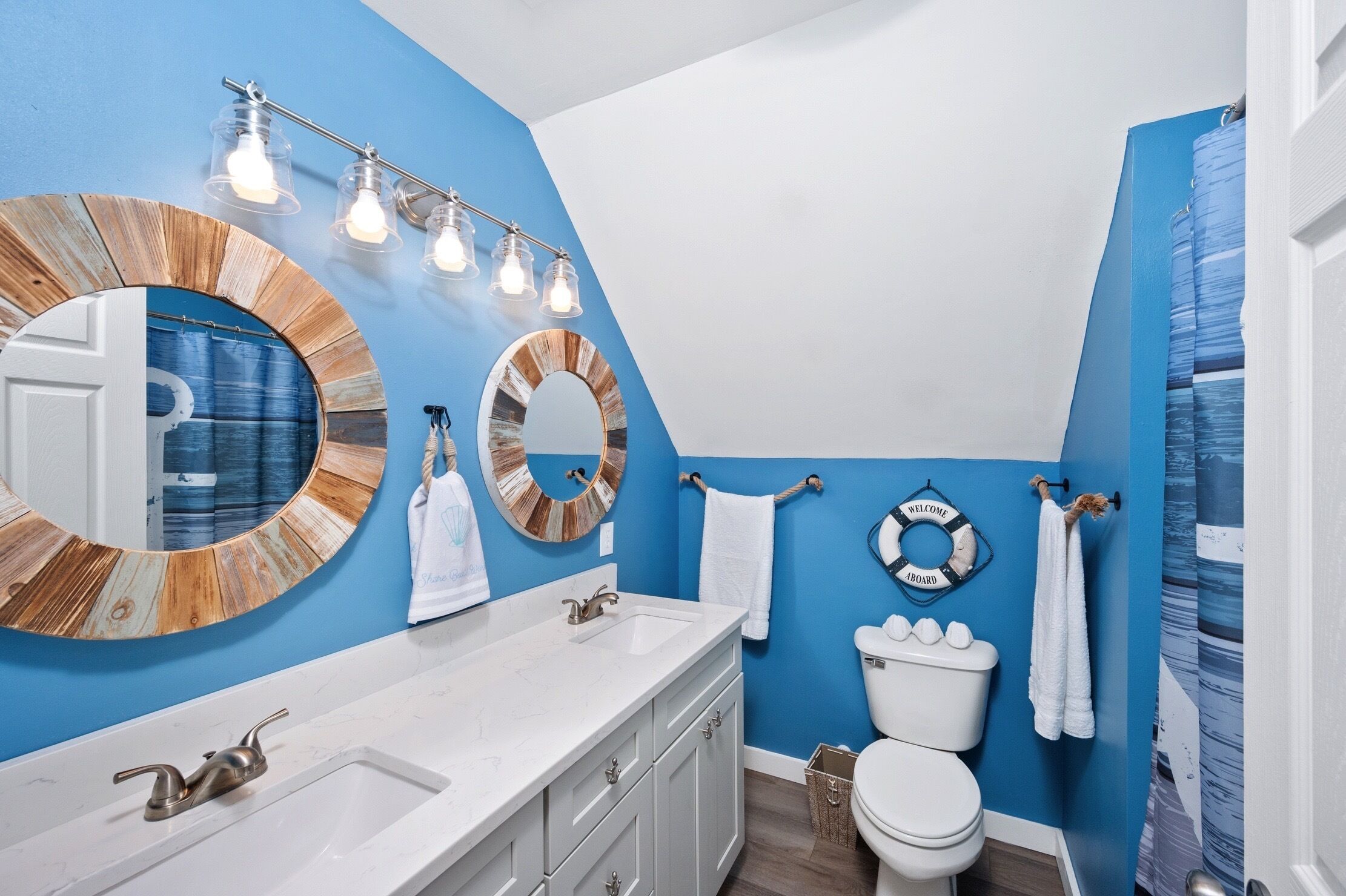 2nd floor bathroom with two sinks. 