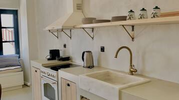 Fridge, oven, coffee/tea maker, toaster