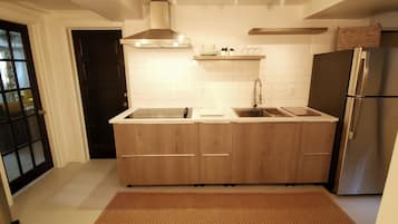 Fridge, microwave, stovetop, coffee/tea maker