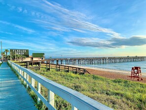 On the beach, sun loungers, beach towels