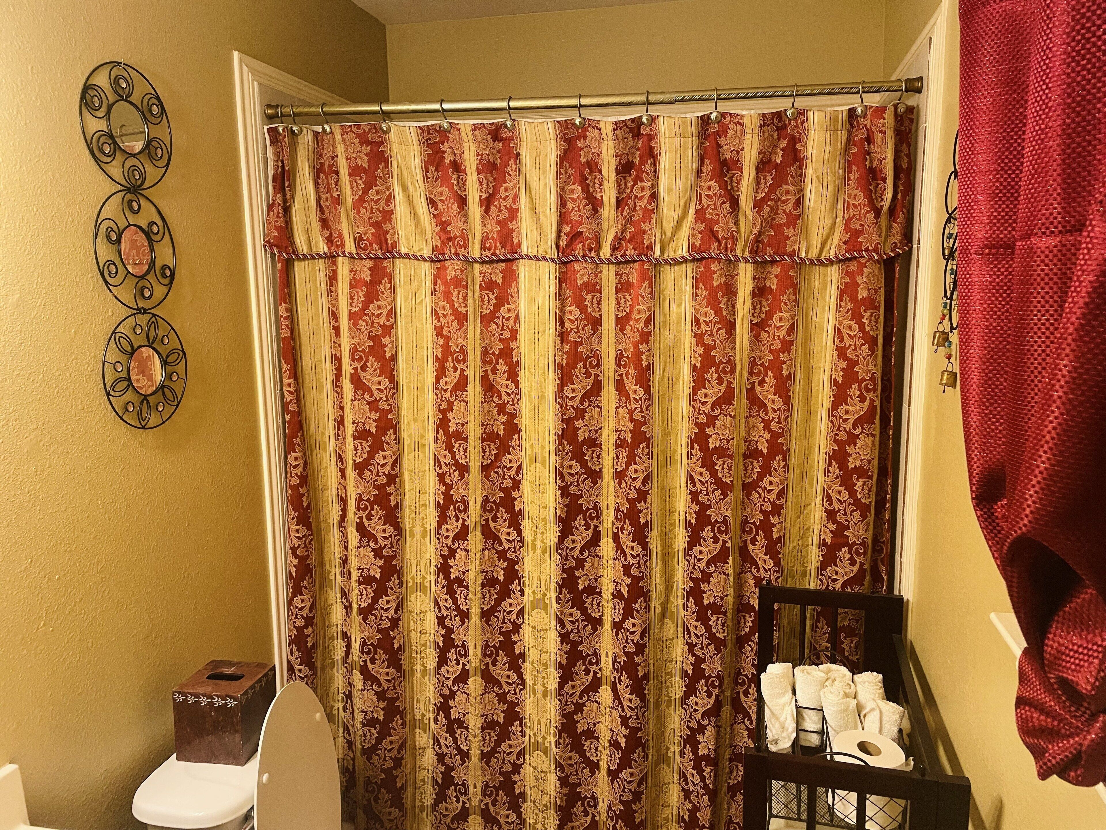 Combined shower/tub, hair dryer, towels, soap