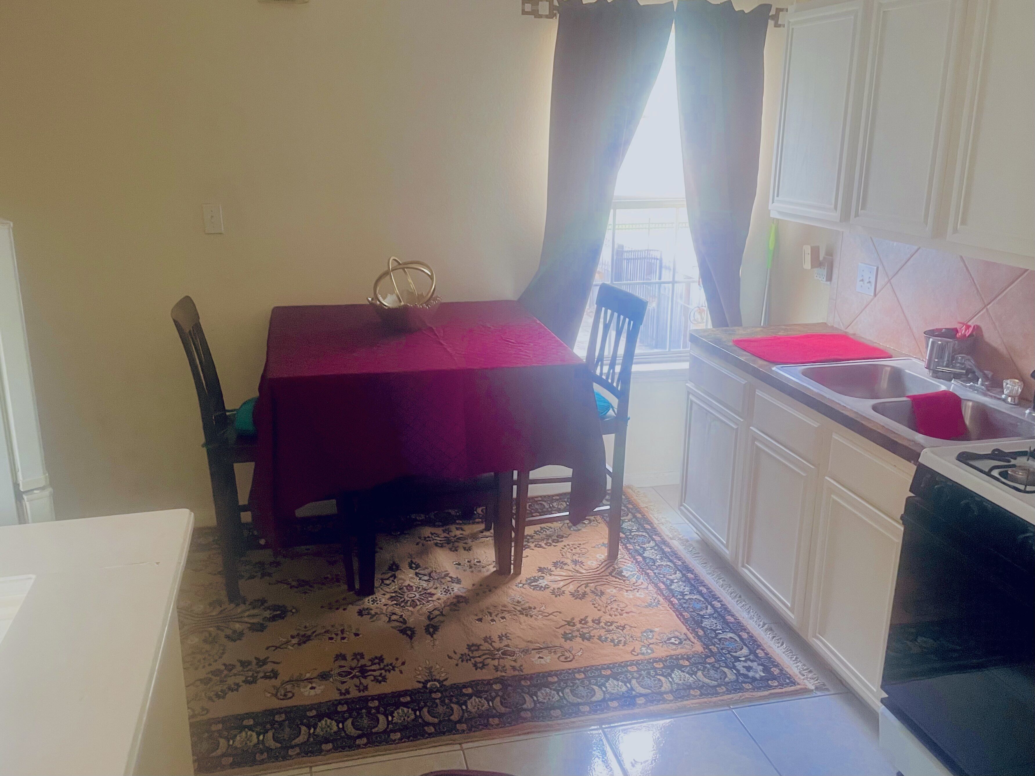 Fridge, microwave, coffee/tea maker, cookware/dishes/utensils