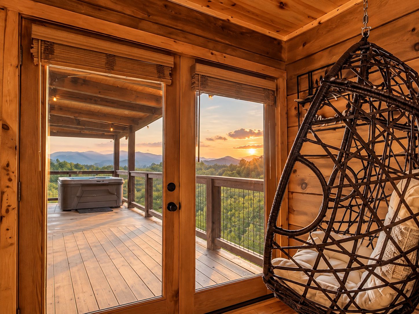A wooden cabin with a deck, a hanging chair, and a view of mountains.