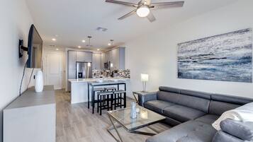Condo, 1 Bedroom | Living area | TV, fireplace, offices