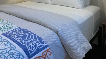 2 dormitorios, tabla de planchar con plancha, cuna de viaje y wifi