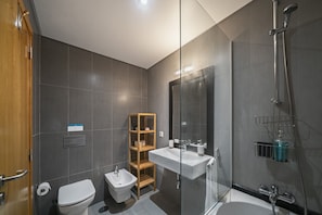 Bathtub, hair dryer, towels