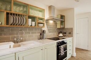 Refrigerador, microondas, lavavajillas y periquera 