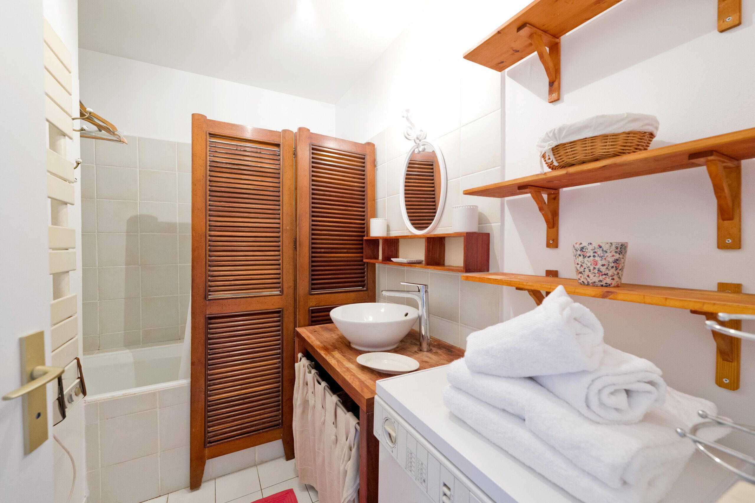 Bathtub, hair dryer, towels
