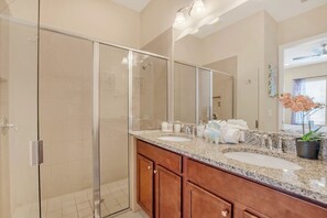 Bathtub, hair dryer, towels, soap