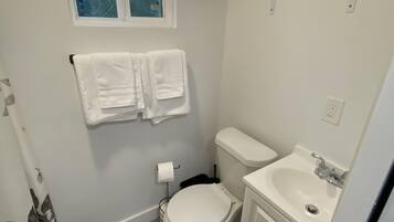 Shower, towels, soap, shampoo