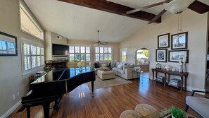 Smart TV, fireplace, books, offices