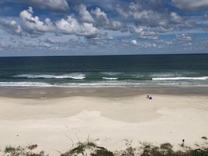 On the beach, sun loungers, beach towels