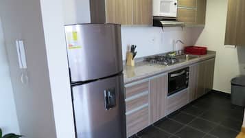 Microwave, coffee/tea maker, cookware/dishes/utensils