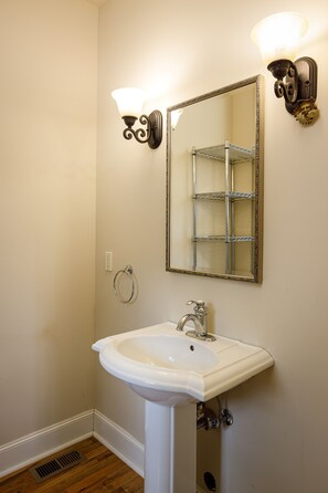 Bathtub, hair dryer, towels, soap