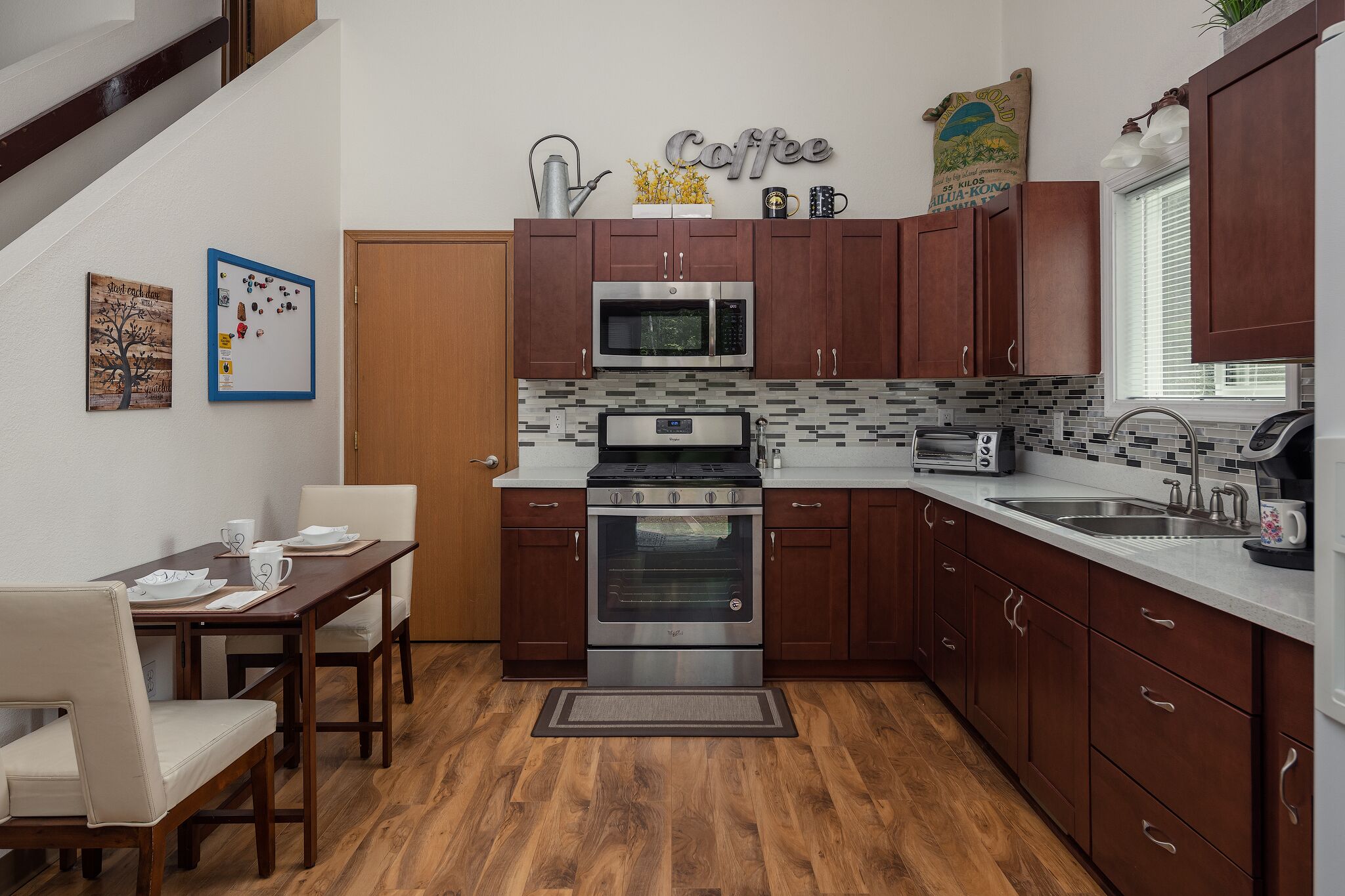 Fridge, microwave, stovetop, coffee/tea maker