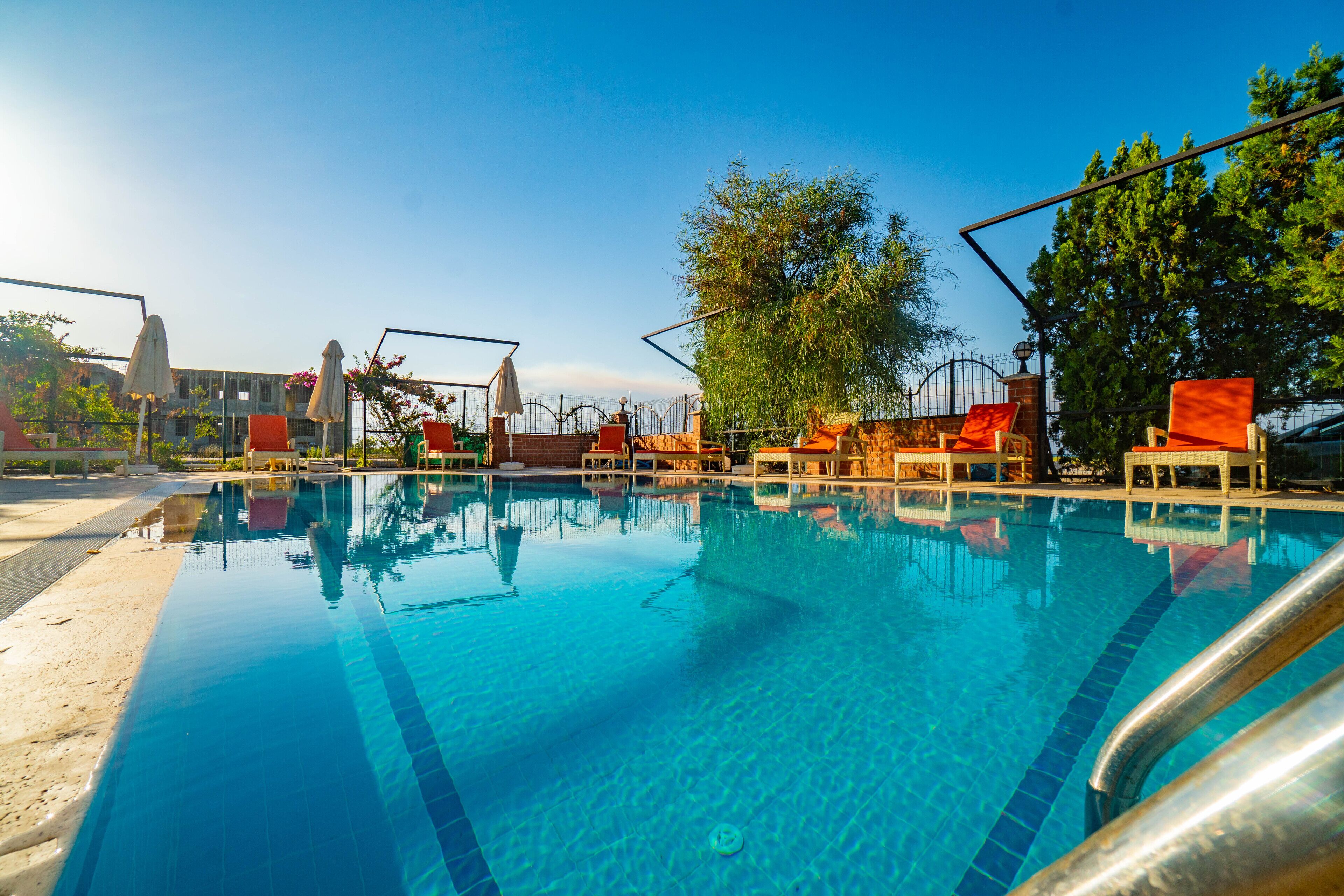 outdoor pool, pool loungers