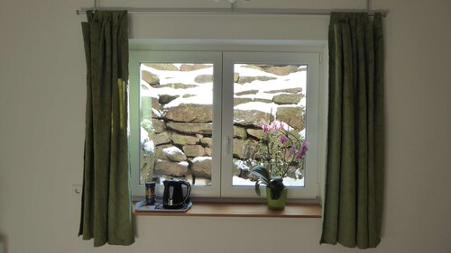 Room with private bathroom in detached house