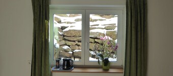 Room with private bathroom in detached house