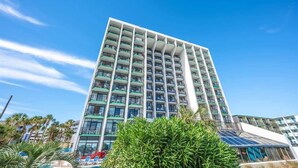 A high-rise hotel with multiple balconies and a modern architectural design. - Ocean Park Private, Luxurious & Incredible Views (Myrtle Beach)