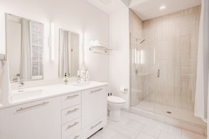 Hair dryer, towels, soap, shampoo