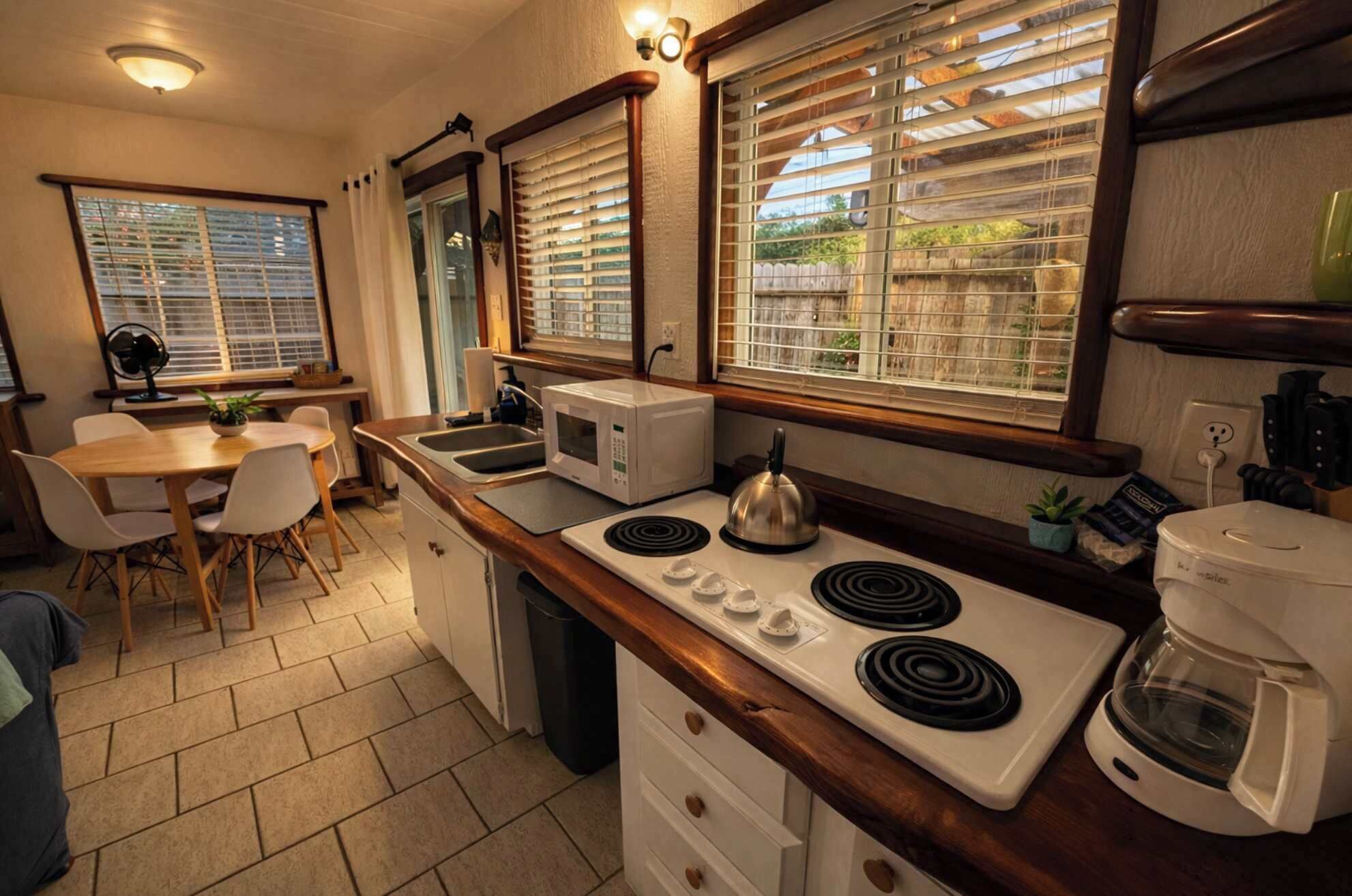 Fridge, microwave, stovetop, coffee/tea maker