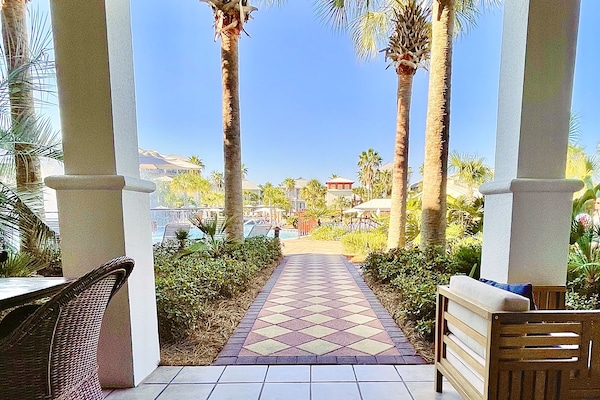 Walk DIRECTLY out to the gorgeous lagoon pool and beautiful landscaping.