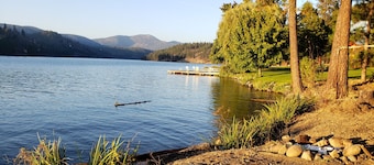 WATERFRONT home on Spokane River w/BOAT LAUNCH, firepit, hot tub, privacy, views