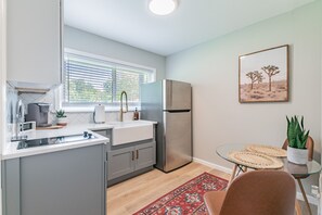 Fridge, microwave, coffee/tea maker, toaster