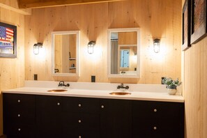 Shower, hair dryer, towels, toilet paper