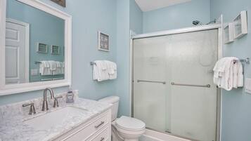 Shower, hair dryer, towels, soap