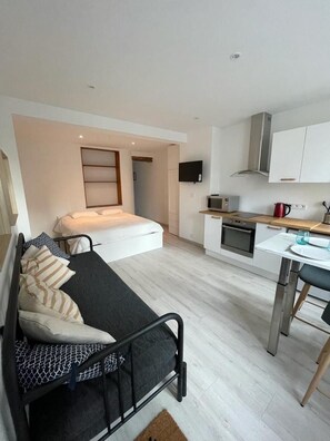 Iron/ironing board, travel crib, free WiFi, bed sheets