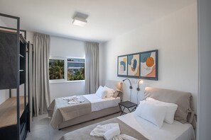 5 habitaciones, caja de seguridad en la habitación y escritorio