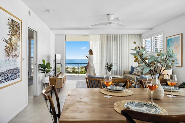 Stylish open plan living space with stunning ocean views.