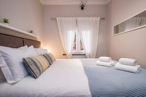 2 habitaciones, tabla de planchar con plancha, internet y ropa de cama 