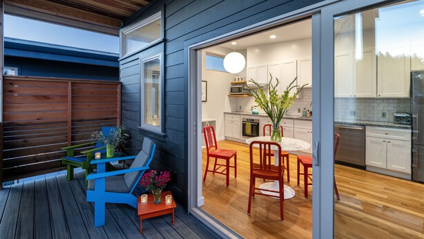 A modern kitchen with white cabinets and a wooden floor. - lower west side style & quality 1BR (Santa Cruz)