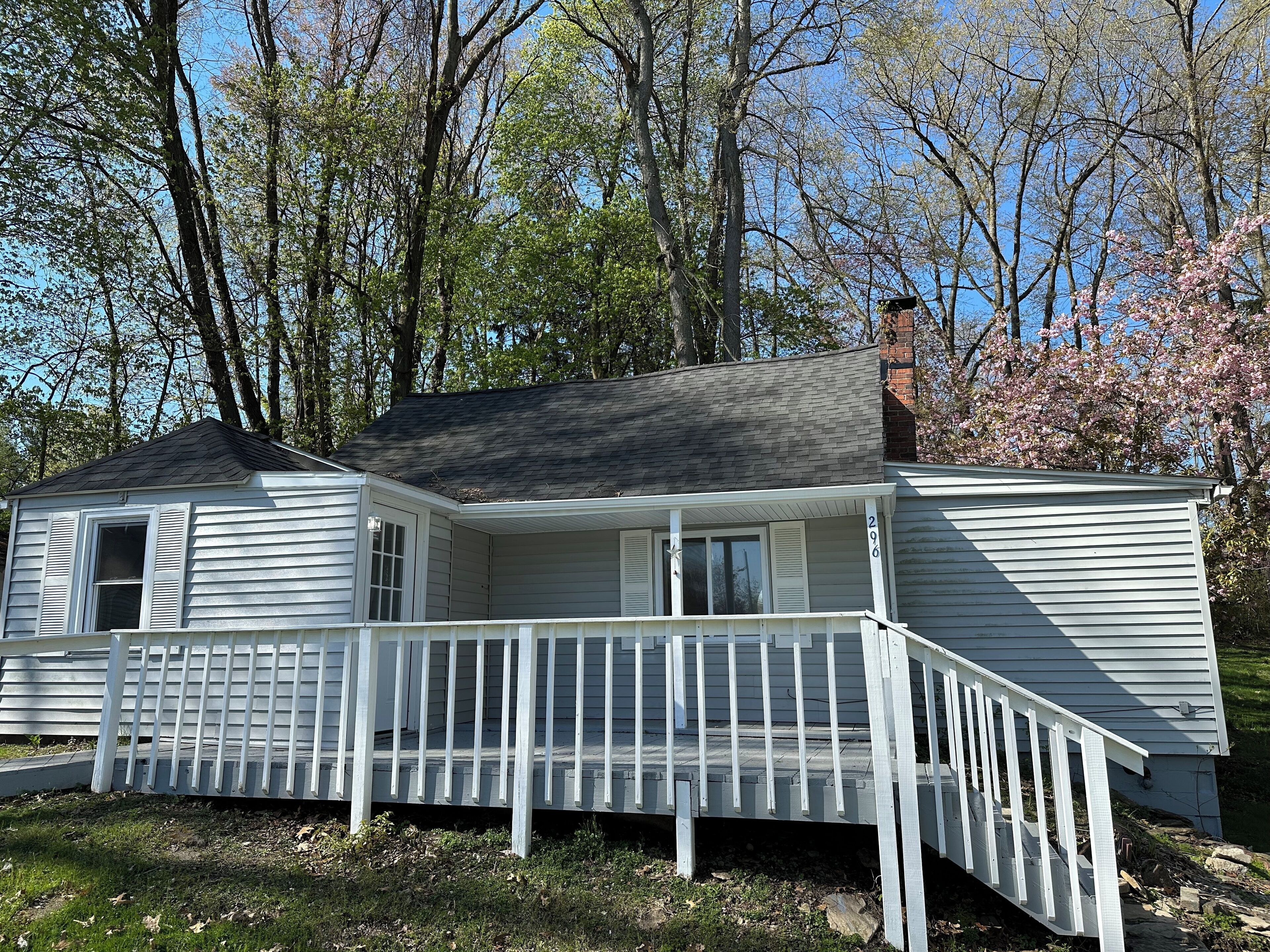 Cozy cottage near The Portage Lakes that sits on a beautiful oversized lot.