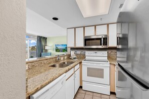 Fridge, microwave, oven, stovetop - Floor to Ceiling Windows at Atlantica Resort 🍹Oceanfront 🍹 (Myrtle Beach)