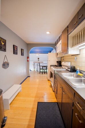 Fridge, microwave, oven, stovetop - The Broadway Condo (Tacoma)