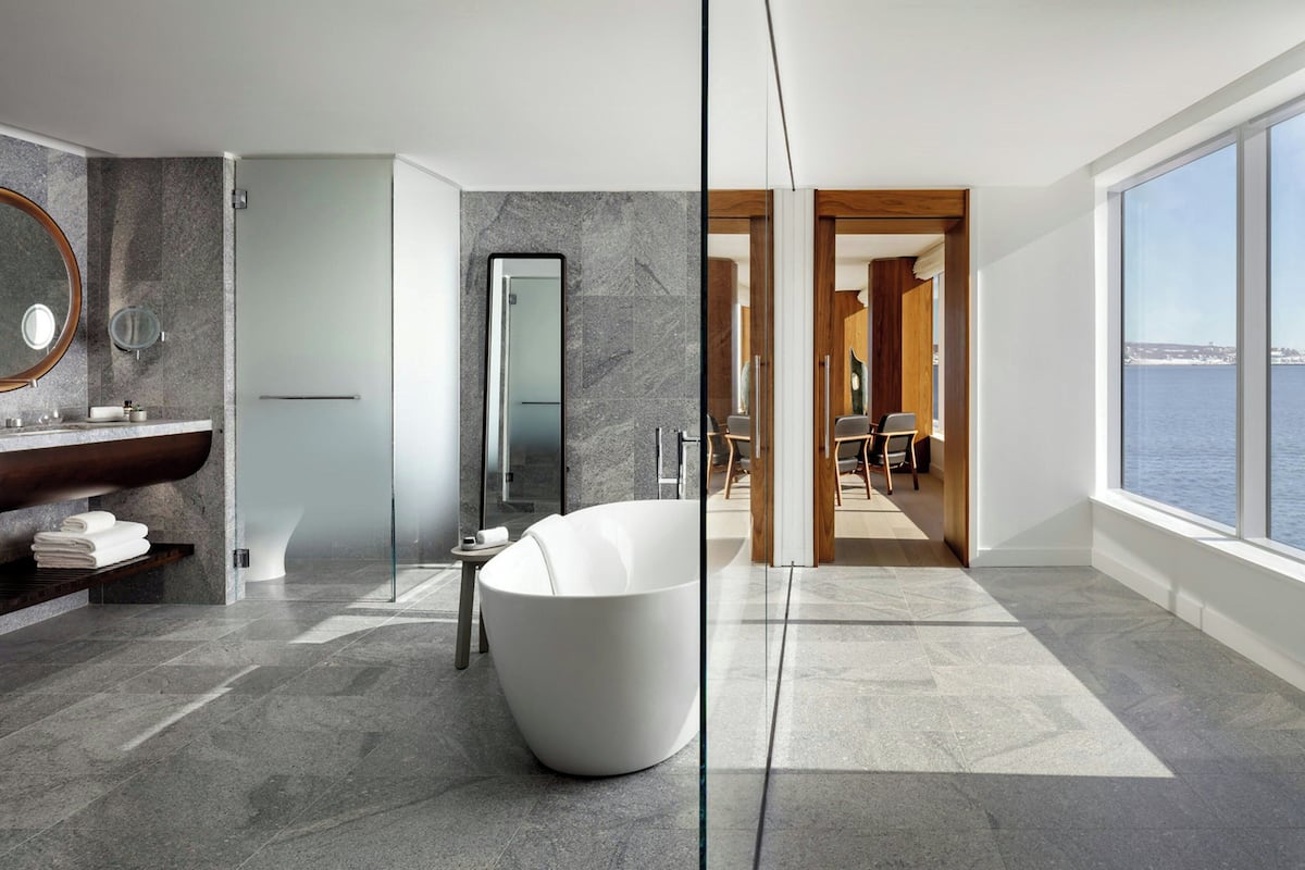 presidential suite, 1 king bed (view) | bathroom | deep-soaking bathtub, rainfall showerhead, free toiletries, hair dryer