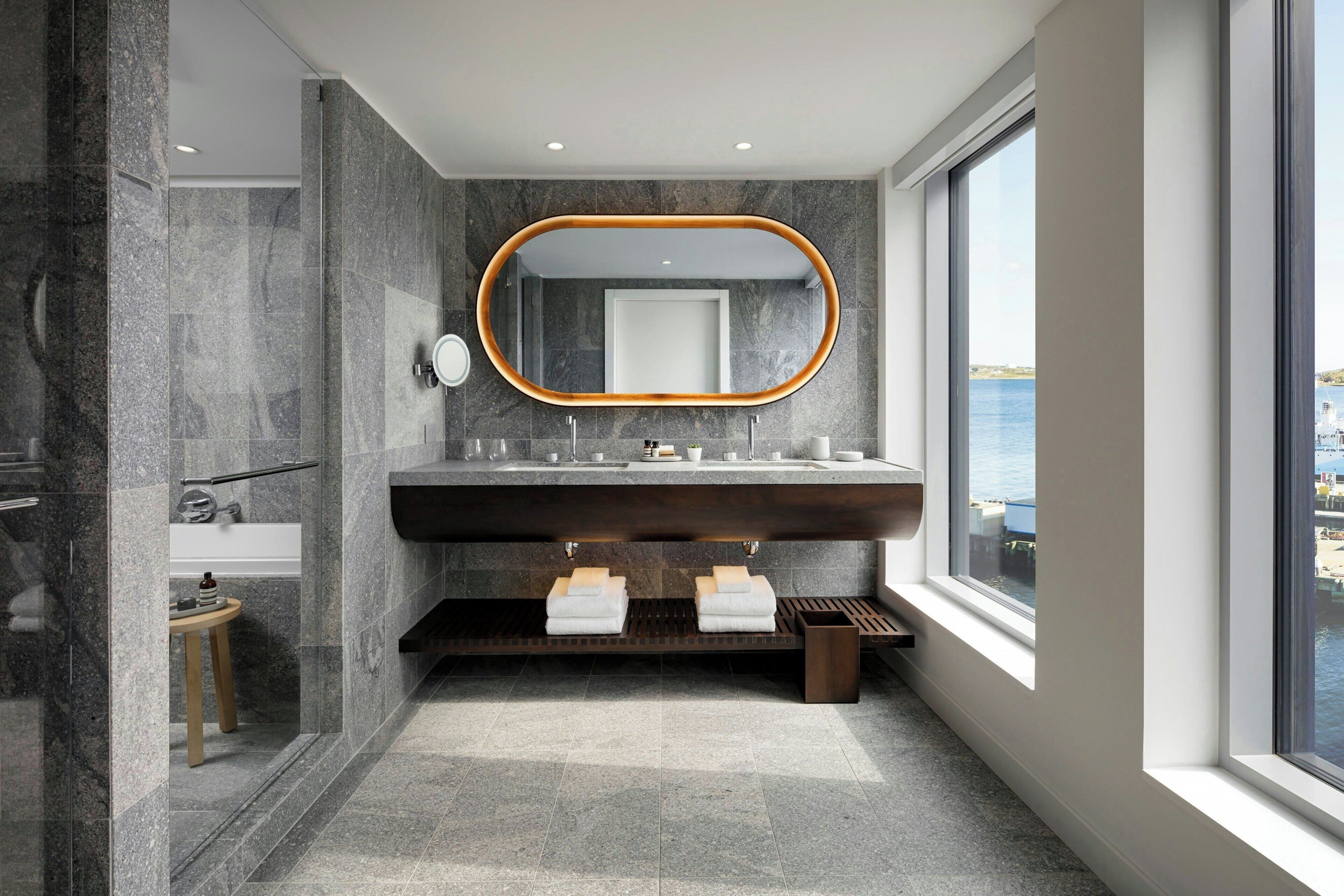 deep-soaking bathtub, rainfall showerhead, free toiletries, hair dryer