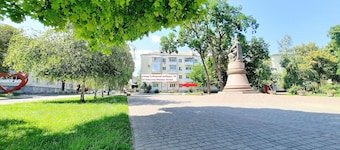 White rotunda. Apartment with a view. Alex Apartments