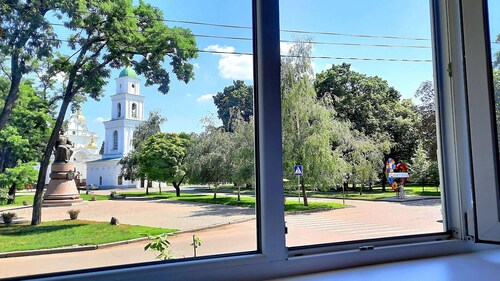 White rotunda. Apartment with a view. Alex Apartments
