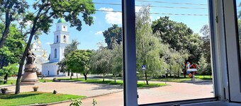 White rotunda. Apartment with a view. Alex Apartments
