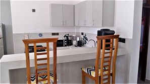 Fridge, microwave, oven, coffee/tea maker