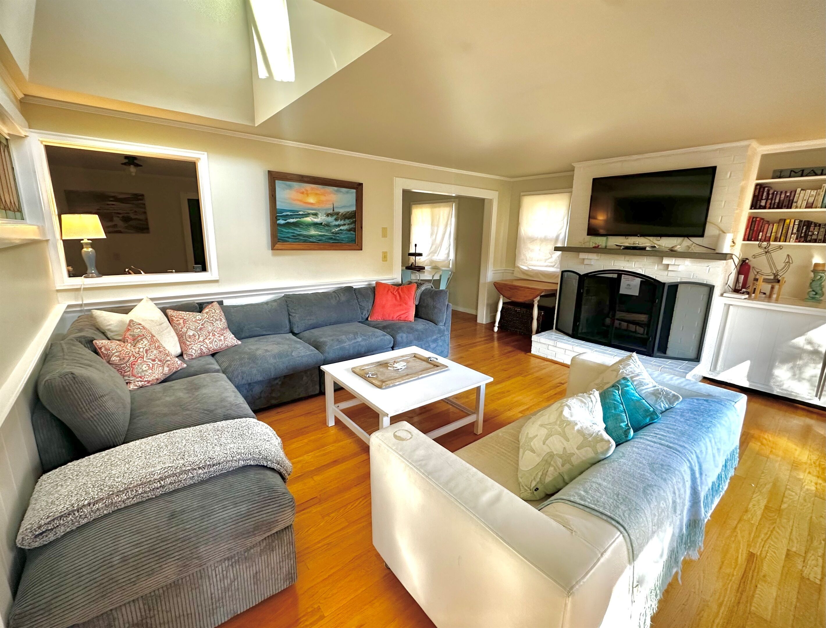 Smart TV, fireplace, books