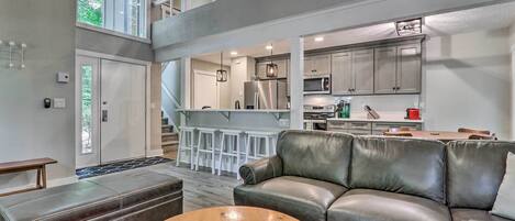 TV, fireplace, video game console, books