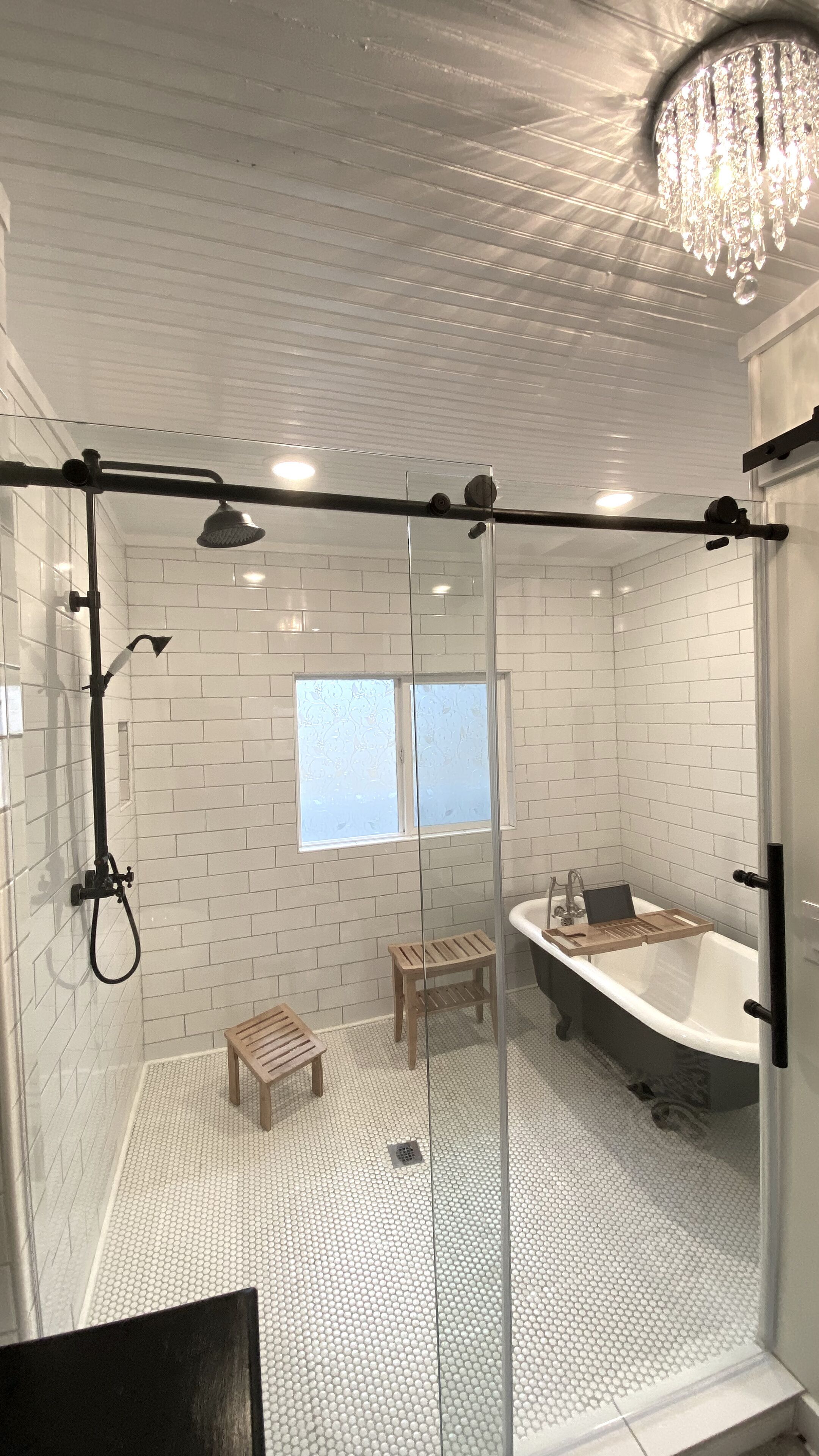 Bathtub, hair dryer, towels, soap