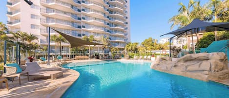 Outdoor pool, pool umbrellas, sun loungers